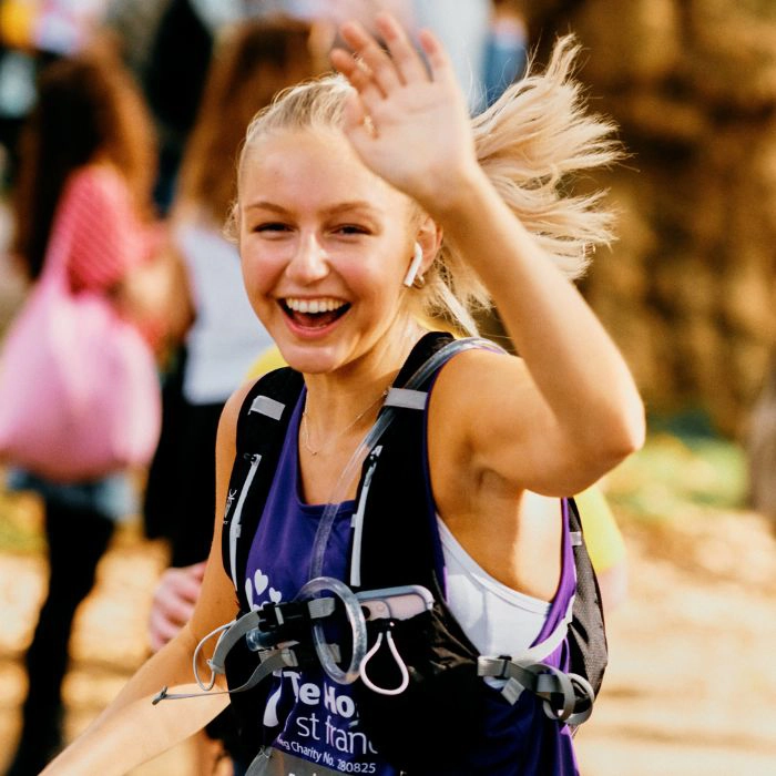 Runner waving